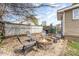 Backyard featuring a seating area with a firepit and stone ground cover at 665 Melbourne Ct, Charlotte, NC 28209