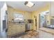 Well-lit kitchen with granite countertops, stainless steel appliances, and a classic tile backsplash at 665 Melbourne Ct, Charlotte, NC 28209