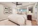 Bedroom with hardwood floors, a window, and soft lighting, creating a cozy atmosphere at 700 Cooper Dr, Charlotte, NC 28210