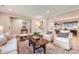 Bright living room with hardwood floors and lots of space for seating and decor at 700 Cooper Dr, Charlotte, NC 28210