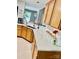 Bright kitchen featuring wood cabinetry, light countertops, and tile backsplash at 7515 Shadowstone Dr, Charlotte, NC 28270