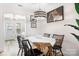Inviting dining room with a wooden table, stylish lighting, and decor at 7910 Camden Hollow Rd, Huntersville, NC 28078