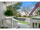 View from the porch, showcasing a peaceful neighborhood and the American flag at 7910 Camden Hollow Rd, Huntersville, NC 28078