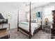 Bedroom with four poster bed, ceiling fan and two bedside tables at 7982 Buena Vista Dr, Denver, NC 28037