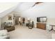 Spacious bonus room with comfortable furniture and a view of a closet at 7982 Buena Vista Dr, Denver, NC 28037