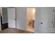 Bathroom with tiled floors and a view into an additional bathroom at 925 14Th St, Lancaster, SC 29720