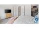 Comfortable bedroom featuring neutral decor and a view of the walk-in closet at 9914 Ainslie Downs St, Charlotte, NC 28273