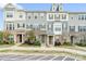 Charming townhomes with stone accents, varied siding colors, and inviting front entrances at 9914 Ainslie Downs St, Charlotte, NC 28273