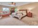 Spacious bedroom featuring a king bed, comfortable sitting area, and ample natural light at 10315 Washam Potts Rd, Cornelius, NC 28031