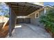 Spacious carport with ample parking space and access to the house at 106 N Turner Ave, Charlotte, NC 28216