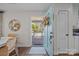 Bright entryway showcasing hardwood floors and a welcoming view of the front porch at 106 N Turner Ave, Charlotte, NC 28216