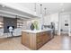 Open-concept kitchen featuring a large island, stainless steel appliances, and ample cabinet space at 111 Monbo Meadows Ln, Statesville, NC 28677