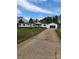 Spacious home with an attached garage, a long driveway, a well-maintained lawn, and charming curb appeal at 1110 Hollyberry Ln, Salisbury, NC 28147