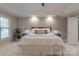 Main bedroom showcasing natural light and soothing colors at 1176 Fawn Ridge Nw Rd, Concord, NC 28027