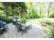 Cozy patio area with outdoor furniture, ideal for relaxing and enjoying the peaceful backyard at 1201 Robinhood Cir, Charlotte, NC 28227