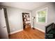 Bedroom with hardwood floors, a window, and a closet at 1201 Robinhood Cir, Charlotte, NC 28227