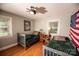 Bedroom featuring twin beds, hardwood floors, and natural light at 1201 Robinhood Cir, Charlotte, NC 28227