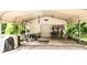 Large, open carport with room for multiple vehicles and storage at 1201 Robinhood Cir, Charlotte, NC 28227