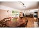 Open dining area showcases hardwood floors, stylish light fixtures, and an inviting atmosphere at 1201 Robinhood Cir, Charlotte, NC 28227
