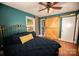 Main bedroom showcasing a sliding barn door leading to the en-suite bathroom at 1201 Robinhood Cir, Charlotte, NC 28227