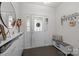 Bright entryway with decorative shelves, and front door, showcasing modern design at 1245 Pebble Grove Dr, Clover, SC 29710