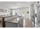 Modern kitchen with a granite countertop island, stainless steel appliances, and an open layout at 1245 Pebble Grove Dr, Clover, SC 29710