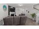Inviting living room featuring hardwood floors, a fireplace, and comfortable seating at 1245 Pebble Grove Dr, Clover, SC 29710