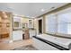 Bathroom featuring double sinks, a makeup vanity, and an enclosed bathtub at 12932 Westmoreland Farm Rd, Davidson, NC 28036