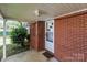 Inviting front porch with a brick facade and space for outdoor relaxation at 1315 Arbor Dr, Salisbury, NC 28144