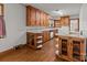 Spacious kitchen with natural wood cabinets, open shelving, and ample counter space at 1315 Arbor Dr, Salisbury, NC 28144