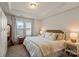 Bright bedroom boasts a tray ceiling, large window, and neutral decor for a relaxing retreat at 1354 Galloway Rd, Charlotte, NC 28262