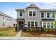 Charming gray two-story townhouse with stone accents and a manicured front yard at 1354 Galloway Rd, Charlotte, NC 28262