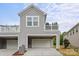 Charming home featuring attached garages, upper balcony and landscaped yard at 1354 Galloway Rd, Charlotte, NC 28262