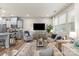 Open-concept living room and kitchen area with modern appliances and stylish furnishings at 1354 Galloway Rd, Charlotte, NC 28262