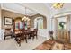 Elegant dining room with classic furnishings and ample natural light, perfect for formal gatherings at 13924 Island Dr, Huntersville, NC 28078