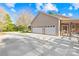 Spacious three car garage with ample parking and large concrete driveway at 13924 Island Dr, Huntersville, NC 28078