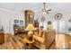 Bright and airy living room features a stone fireplace, vaulted ceilings, and an open layout at 13924 Island Dr, Huntersville, NC 28078