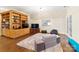 Bright living room with built-in shelving, plush rug, and natural light at 1404 Churchill Downs Dr, Waxhaw, NC 28173