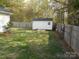 Backyard featuring a storage shed with double doors at 158 Margaret Turner Rd, Charlotte, NC 28216