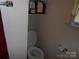 Practical half bathroom with essential fixtures and neutral decor at 158 Margaret Turner Rd, Charlotte, NC 28216