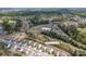 Aerial view of community amenities including a pool and roundabout near 16803 Cozy Cove Rd at 16803 Cozy Cove Rd, Charlotte, NC 28278