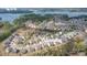 Stunning aerial view of a residential community with a lake in the background at 16803 Cozy Cove Rd, Charlotte, NC 28278