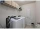 Convenient laundry room with modern washer and dryer at 16803 Cozy Cove Rd, Charlotte, NC 28278