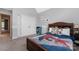 ' bedroom showcasing a bed with themed bedding, playful decor, and storage at 17309 Knoxwood Dr, Huntersville, NC 28078
