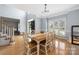 Dining room with stylish decor, window view, and hardwood floors at 17309 Knoxwood Dr, Huntersville, NC 28078