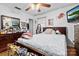 A cozy bedroom featuring hardwood floors and a ceiling fan at 175 Neita Dr, Salisbury, NC 28147