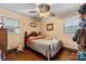 This comfy bedroom features wood trim, ceiling fan, and a window for natural light at 175 Neita Dr, Salisbury, NC 28147