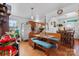 Eat-in kitchen features a charming booth, natural light, and a view to the dining room at 175 Neita Dr, Salisbury, NC 28147
