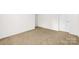 Carpeted bedroom with a window and a closet door at 1957 Beth Haven Church Rd, Denver, NC 28037