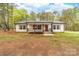Charming single-story home with a cozy front porch and well-maintained yard at 1957 Beth Haven Church Rd, Denver, NC 28037
